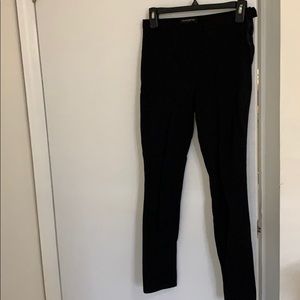 Skinny leg trousers with zipper side closure